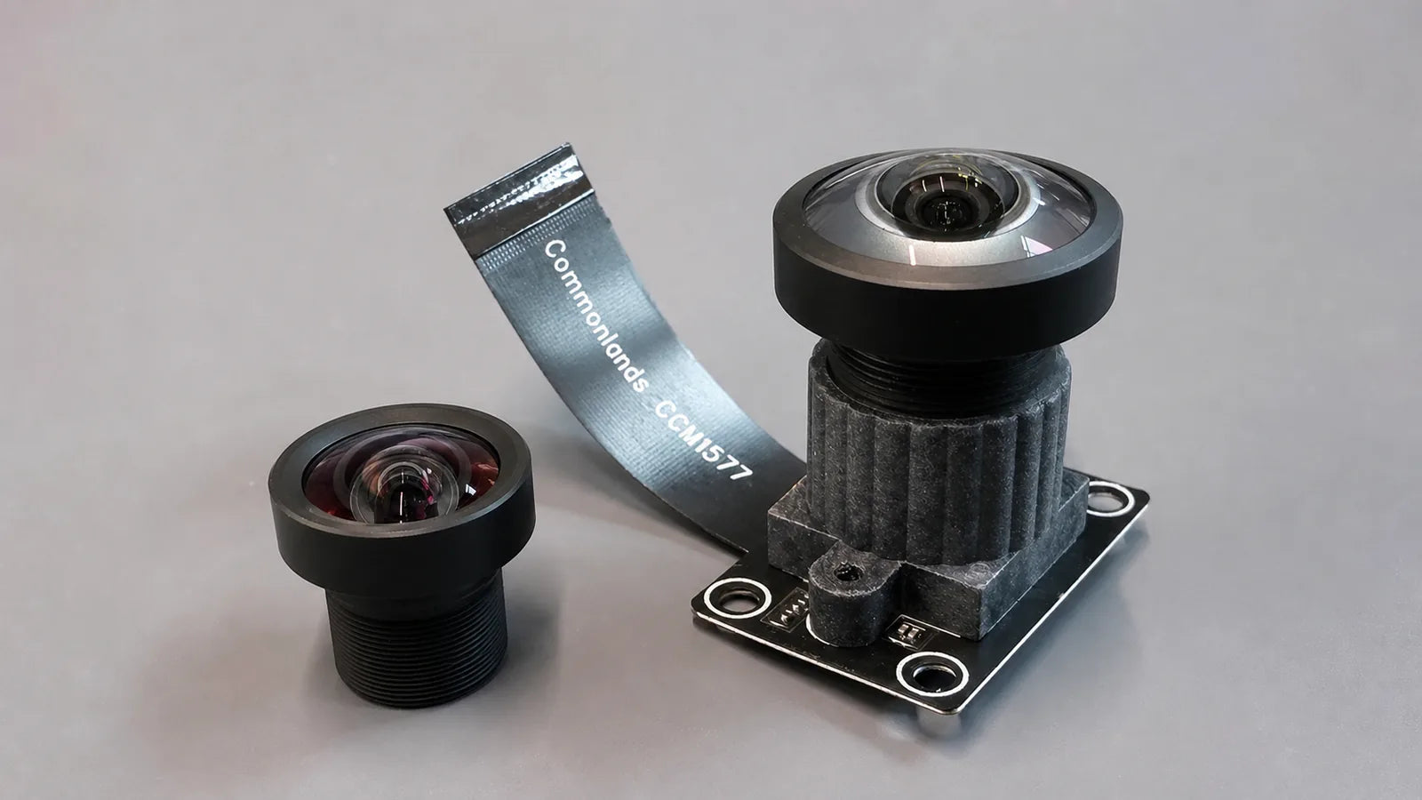 Commonlands M12 lens in an aluminum holder on a board-level camera module before active alignment