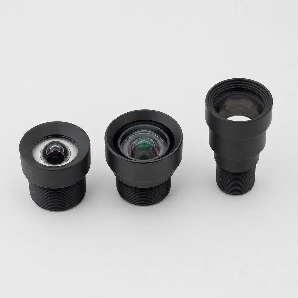 Three Commonlands M12 lenses, short, medium, and tall, showing how barrel length tracks focal length