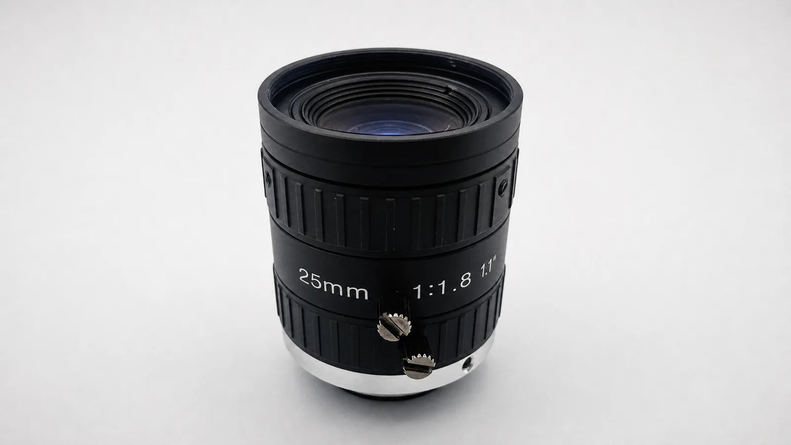 A Commonlands C-mount lens whose multi-element design corrects machine vision aberrations