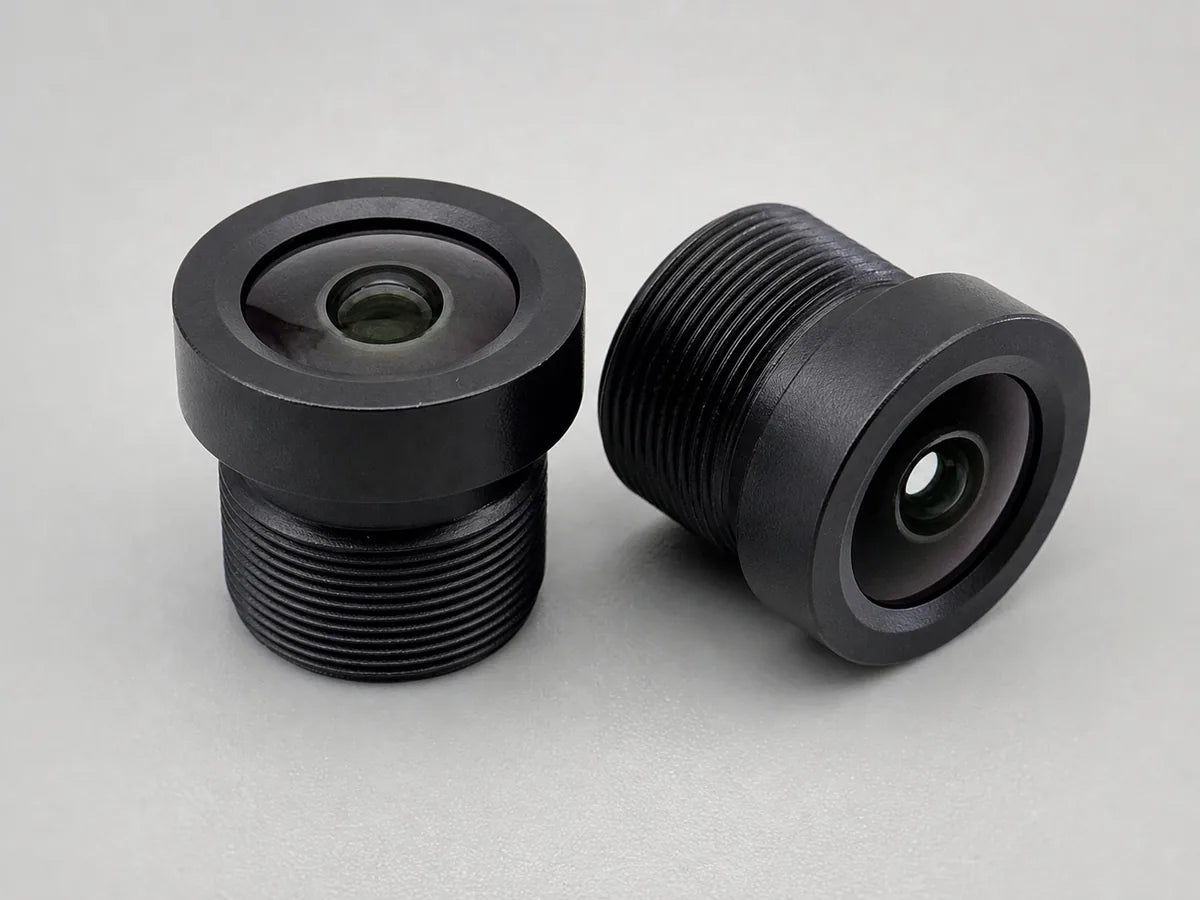 An all-glass all-metal Commonlands M12 lens threaded into a board-level camera for thermal stability