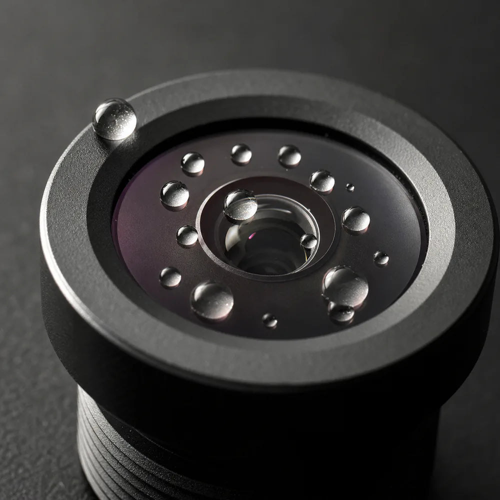 Water beading tightly on the hydrophobic front coating of a Commonlands lens front element